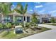 Street view of attractive homes with a well manicured lawn and a beautiful blue sky at 5814 Stockport St, Riverview, FL 33578