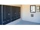 Community mailboxes with individual slots and secure locks, accompanied by a notice board for resident updates at 7869 Timberview Loop, Wesley Chapel, FL 33545
