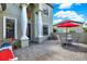 Charming exterior features an inviting patio with outdoor seating by the front door at 8420 Dunham Station Dr, Tampa, FL 33647