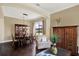 Open-concept home showcasing hardwood floors, elegant furniture, and natural light at 8420 Dunham Station Dr, Tampa, FL 33647