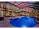 Beautiful screened-in pool area with a relaxing spa, and open patio space perfect for entertaining at 8420 Dunham Station Dr, Tampa, FL 33647