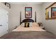 Cozy bedroom featuring a four-poster bed and warm, inviting decor, creating a relaxing retreat at 9916 Preakness Stakes Way, Dade City, FL 33525