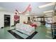 Cozy common room with floral sofas, lounge area, and pool table at 4252 Sheldon Pl # 4252, New Port Richey, FL 34652