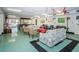 Inviting common room with comfortable sofas, chairs and a pool table at 4252 Sheldon Pl # 4252, New Port Richey, FL 34652