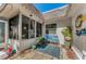 Charming courtyard with brick pavers, seating, and potted plants, creating a cozy and inviting outdoor space at 4252 Sheldon Pl # 4252, New Port Richey, FL 34652