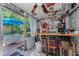 Entertaining patio with a bar, ceiling fan, and seating area outside at 4252 Sheldon Pl # 4252, New Port Richey, FL 34652