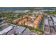 Elevated view of the neighborhood featuring the community with a tennis court at 10764 70Th Ave # 1205, Seminole, FL 33772