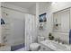 Bright bathroom with white tiled shower and tub combination at 10764 70Th Ave # 1205, Seminole, FL 33772