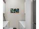 Laundry room features a front-load washer and dryer set with colorful artwork displayed on the wall at 10764 70Th Ave # 1205, Seminole, FL 33772