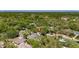 Aerial view of a home's location and proximity to green spaces, showcasing neighborhood layout at 12116 N 52Nd St, Temple Terrace, FL 33617