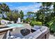 Beautiful backyard retreat with inviting pool, deck, and comfortable outdoor seating area at 12116 N 52Nd St, Temple Terrace, FL 33617