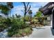 Private backyard pool area with tropical landscaping, providing a serene and refreshing outdoor escape at 12116 N 52Nd St, Temple Terrace, FL 33617