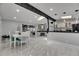 Spacious living area with dining space, kitchen, and recessed lighting at 12116 N 52Nd St, Temple Terrace, FL 33617