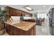 Large kitchen featuring granite countertops and stainless appliances at 12274 1St W St # 2, Treasure Island, FL 33706