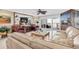 Cozy living room with ocean views, fireplace, and comfortable seating at 12274 1St W St # 2, Treasure Island, FL 33706