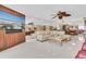 Spacious living room with tile floors, large TV and views of the ocean at 12274 1St W St # 2, Treasure Island, FL 33706