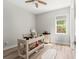 Bright study featuring a vintage desk, wood floors, and a window with natural light at 12546 Wildebeest Way, Spring Hill, FL 34610