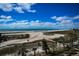 Wide beach view with turquoise water and cloudscape sky at 1270 Gulf Blvd # 501, Clearwater Beach, FL 33767