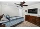Bedroom featuring neutral walls, tile floors, dresser, and a comfortable striped bed at 1270 Gulf Blvd # 501, Clearwater Beach, FL 33767