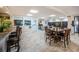 Inviting common room featuring bar seating, tables, and comfortable seating areas at 1270 Gulf Blvd # 501, Clearwater Beach, FL 33767