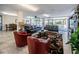 Stylish common room with plush seating, ceiling fans, and access to outdoor views at 1270 Gulf Blvd # 501, Clearwater Beach, FL 33767