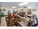 Spacious common room with leather couches, red chairs, and access to common areas at 1270 Gulf Blvd # 501, Clearwater Beach, FL 33767