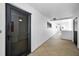 Interior view of a residential hallway with tile flooring and recessed lighting near unit 501 at 1270 Gulf Blvd # 501, Clearwater Beach, FL 33767