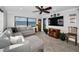 Open living space with ocean views, sectional sofa, ceiling fan and tiled floors at 1270 Gulf Blvd # 501, Clearwater Beach, FL 33767