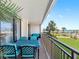 Enjoy the stunning ocean views from this inviting balcony with comfortable seating and a dining table at 1430 Gulf Blvd # 102, Clearwater Beach, FL 33767