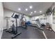 Well-equipped fitness center with modern exercise machines, weights, and motivational decor at 1430 Gulf Blvd # 102, Clearwater Beach, FL 33767