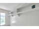Closet with built-in white shelves provide ample storage space and organization at 1655 S Highland Ave # D140, Clearwater, FL 33756