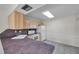 Efficient kitchen with ample counter space, and bright appliances at 1655 S Highland Ave # D140, Clearwater, FL 33756