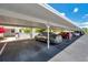 Covered parking area with assigned spots for residents and visitor parking at 1655 S Highland Ave # D140, Clearwater, FL 33756