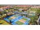 Outdoor pickleball courts offer a fun and active lifestyle for residents in a beautiful community setting at 16840 Whisper Elm St, Wimauma, FL 33598