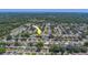 Bird's-eye view of a neighborhood featuring mature trees and well-maintained homes at 1710 S Lake Ave, Clearwater, FL 33756