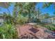Backyard patio with brick pavers and a table that is great for outdoor dining at 1710 S Lake Ave, Clearwater, FL 33756