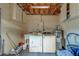 A utility room features a washer, dryer, utility sink, water heater, and storage at 1710 S Lake Ave, Clearwater, FL 33756