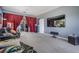 Media room features theater seating, large screen TV and fitness equipment at 19708 Wellington Manor Blvd, Lutz, FL 33549