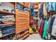 Custom walk-in closet provides ample storage with shelves, drawers, and hanging rods at 19708 Wellington Manor Blvd, Lutz, FL 33549