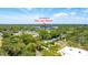 Convenient location near the Blue Jays stadium, surrounded by lush greenery and neighborhood charm at 250 Aberdeen St, Dunedin, FL 34698