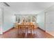 Bright dining room boasts large window and mosaic tile flooring at 250 Aberdeen St, Dunedin, FL 34698