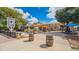 Outdoor brewery seating with picnic tables and barrels, perfect for a casual gathering at 250 Aberdeen St, Dunedin, FL 34698