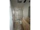 Small bathroom with a shower, toilet, sink, and a plush rug at 2700 Bayshore Blvd # 519, Dunedin, FL 34698