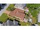 Aerial view of the home with a well-maintained roof, landscaping, and private backyard at 3309 W Ellicott St, Tampa, FL 33614