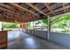 Outdoor patio with a ceiling fan and view of the yard and swimming pool at 3319 Fox Ridge Blvd, Wesley Chapel, FL 33543