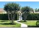 Inviting community pool area with a manicured landscape and secure gated entry at 3611 Pine Knot Dr, Valrico, FL 33596