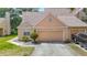 Charming single-Gathering home with a well-manicured lawn and a single-car garage in a desirable neighborhood at 3611 Pine Knot Dr, Valrico, FL 33596