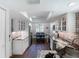 Contemporary kitchen with white cabinets, dark countertops, and stainless steel appliances at 3611 Pine Knot Dr, Valrico, FL 33596