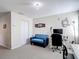 Inviting office space with a comfortable couch, desk, and plenty of room to work at 3611 Pine Knot Dr, Valrico, FL 33596