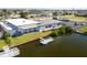 Waterfront backyard showcasing a dock, lush greenery, and tranquil views, perfect for outdoor enjoyment at 4256 Rudder Way, New Port Richey, FL 34652